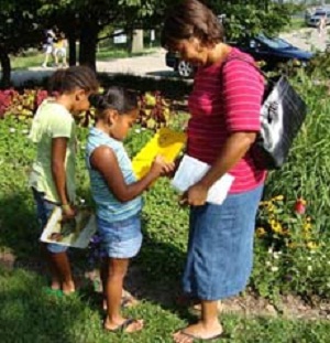 Children in pollinator garden